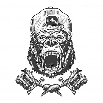 Vintage ferocious gorilla head in cap Free Vector