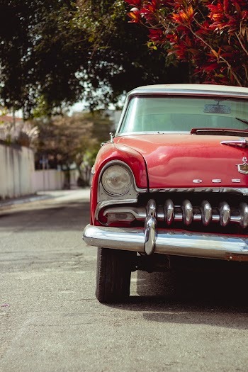 Vintage Red Car Parked on the Street