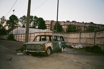 Vintage Station Wagon Parked Near Line Post