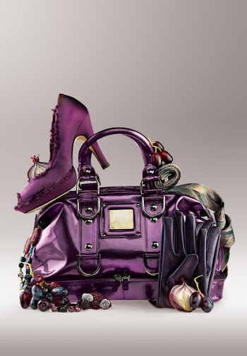 Violet elegance. Violet shoe on a purse with jewelry and gloves.