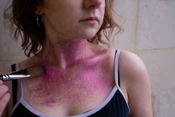 Violet Glitters on Woman's Neck