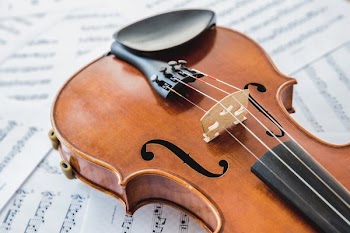 Violin Base  On Music Sheets