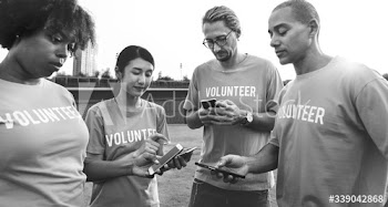 Volunteers posting on social media