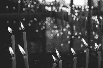 Votive candles in black and white