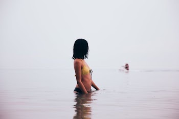 Wading At Beach
