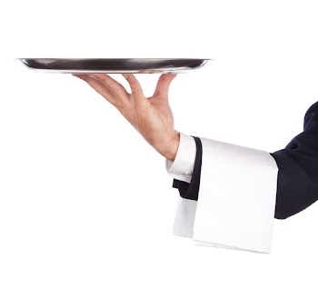 waiter with a silver plate .Isolated on a white background