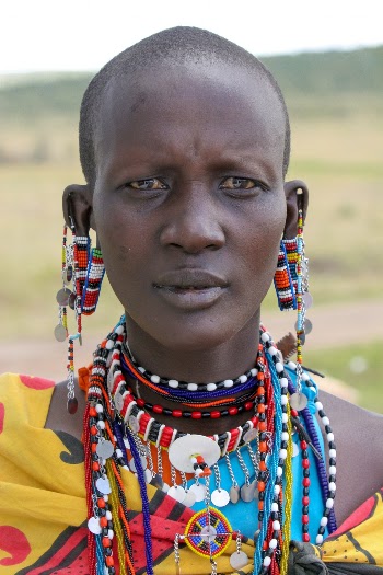 Waiting to get into Maasai Mara this is one of the girls wanting to sell small items
of local crafts…
