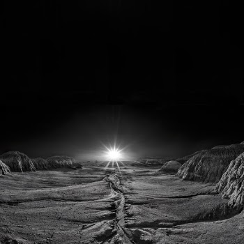Walking around in the Bisti/De-na-zin area of northern New Mexico I used the Rokinon 12/2.8 stopped down to f/22 for the sunburst effect. I added more sky to make a square image, in post.