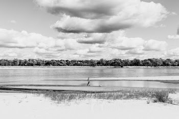 Walking with a dog at the river