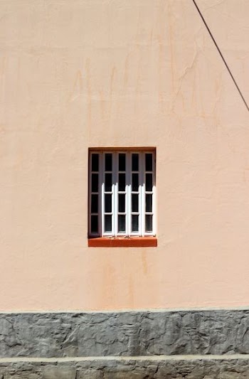 wall with window during daytime