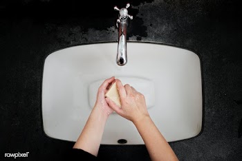 Washing hands with a bar soap to prevent coronavirus contamination | Free  photo - 2290791
