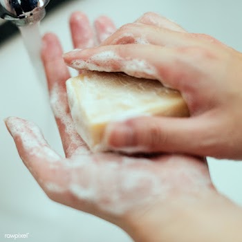 Washing hands with a bar soap to prevent coronavirus contamination | Free  photo - 2296318