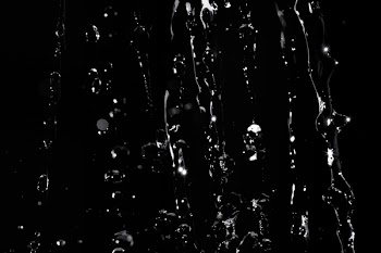 Water Drop in Close-up Photo