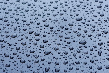 Water Droplets on Blue Surface