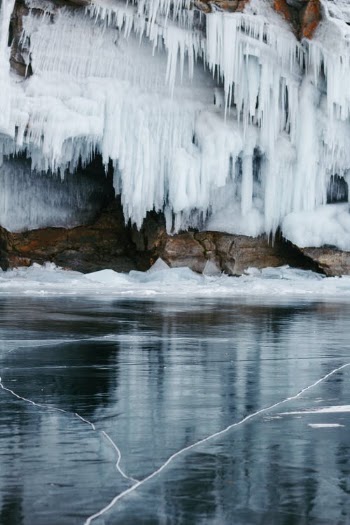 Water Falls on Rocky Shore · Free Stock Photo