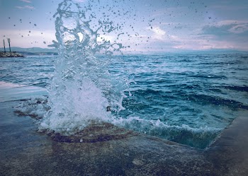 Water Smashing On Concrete Pavement