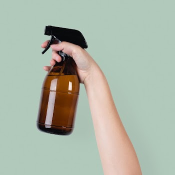 Water spray mist held by a raised hand | Free stock photo | High Resolution image