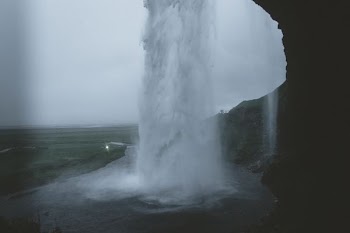 waterfall cave during day time