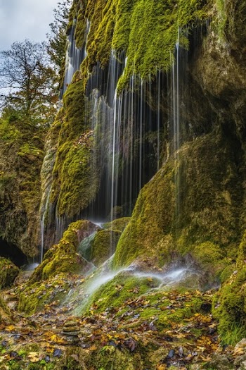 Waterfalls on Mountain Cliff