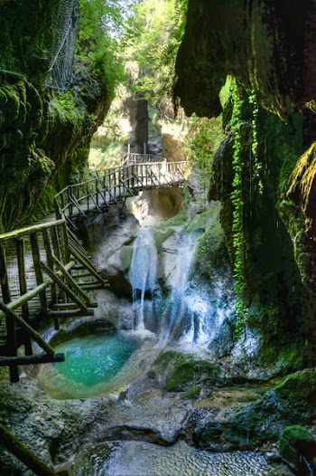 Waterfalls Under Brown Bridge