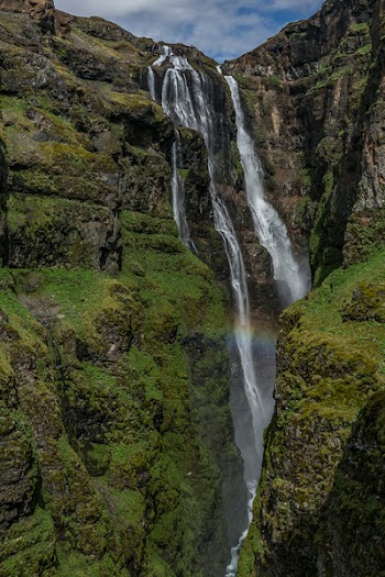 Waterfalls Under White Clouds