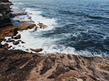 Waves Crashing Into Rocks