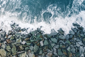 Waves Crashing on Coastal Rocks