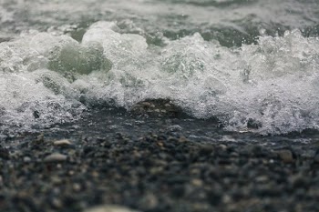 Waves Rolling On Rocky Beach