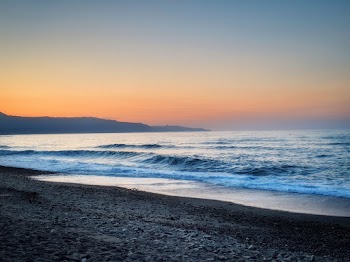 Waves Splashing on Black Sand Beach Shore