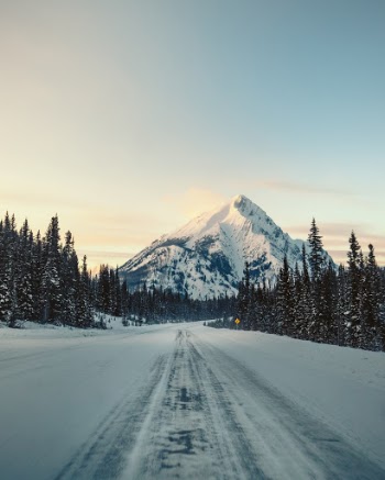 We drove down this road, chasing the silky, wavering fabric of the last golden light of the day. As we weaved around the rocky bend of this mountainous road, we caught sight of this lonely rock, standing mighty and tall, of which we could only describe as the international step brother of the Swiss Matterhorn