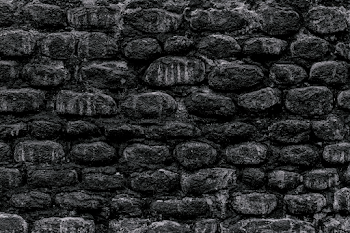 Weathered Black Stone Wall Texture