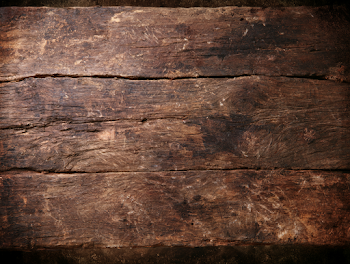 Weathered Dark Brown Wooden Surface Texture