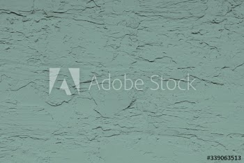 Weathered green concrete wall