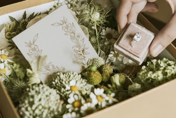Wedding card in flower box | Free Photo - rawpixel