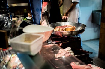 Weighing a beef steak 