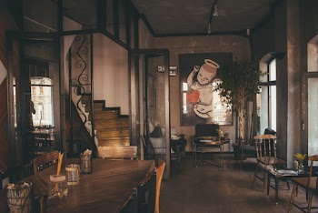 Well-arranged Tables and Chairs Inside Room