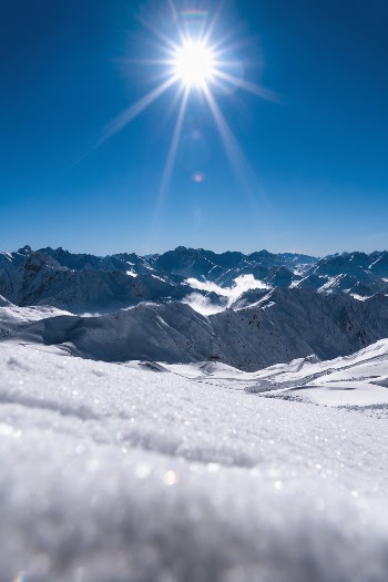 Went on a trip to the mountains with good friends. I was there to go snowboarding. Of course I had my camera in my backpack to get a shot like this one here! What comes into your mind when you see a landscape like this?