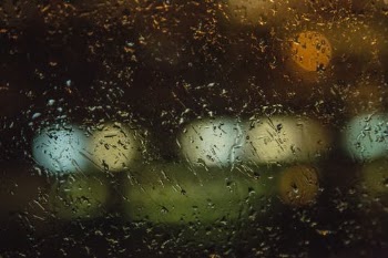 Wet window during rainy weather in city · Free Stock Photo