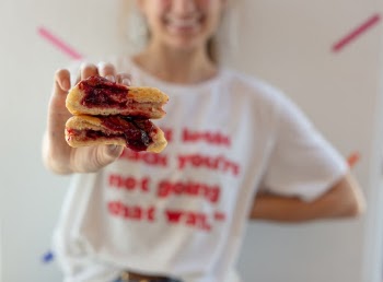 What makes this jelly donut from Guru Donuts special? It was made with love by a mother of young children working 14 hours a day to get her dream business running. From baking, to marketing, to hiring, to sweeping . . . moms get the job done.