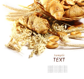 Wheat and bread over white
