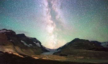 Whilst cycling through the Canadian Rockies in Alberta, I got the chance to shoot the milky way over the Athabasca glacier in Jasper National Park, AB. shot around 3AM. No one else out there but me and the roar of the water from the glacier. Truly surreal experience I cannot wait to have again.

This is a stack of 6 images from my a6300 at ISO 6400, F2.0 at 12mm (18mm FF eq.) Since stacking got rid of all of the noise at that ISO, I got a good Signal/Noise ratio.