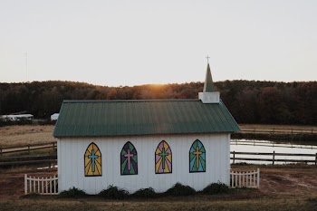 whit and green concrete religious house