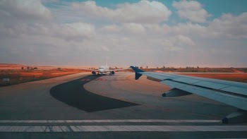 White Airplane on Track