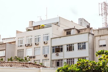 White and Beige Concrete High-rise Building