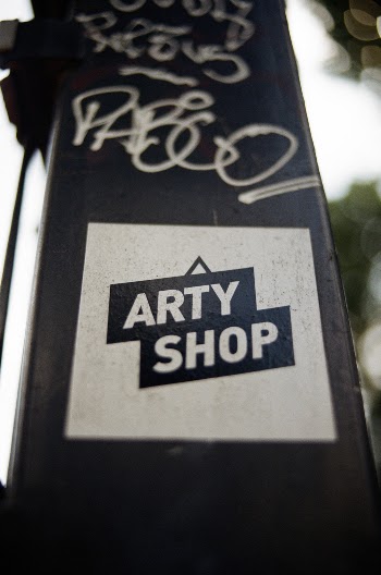 White and Black Arty Shop Sticker