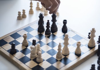 White and Black Chessboard With Pieces