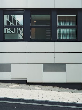 white and black concrete building at daytime
