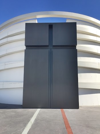 White and Black Concrete Building Under Blue Sky