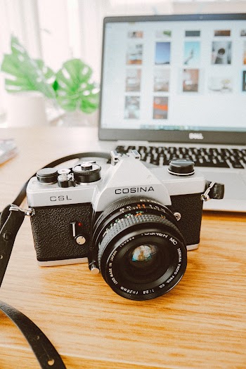 White And Black Cosina Dslr Camera 