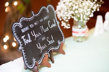 White and Black Labeled Text Decor on Stand